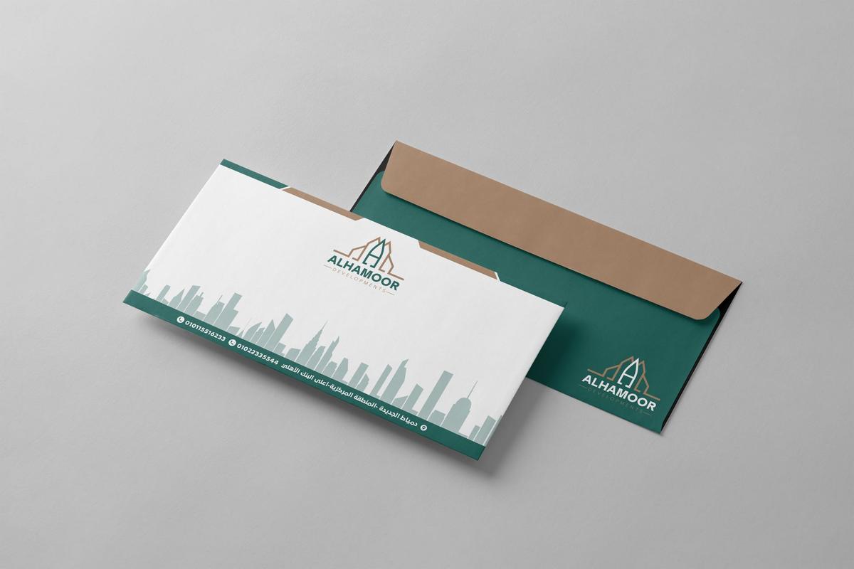 أظرف ومطبوعات مؤسسية — الهامور للتطوير العقاري